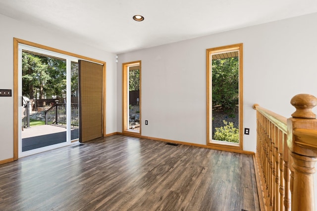 8603 E Columbia Park Dr, Spokane Valley, WA 99212 - empty room with wood finished floors, plenty of natural light, and recessed lighting