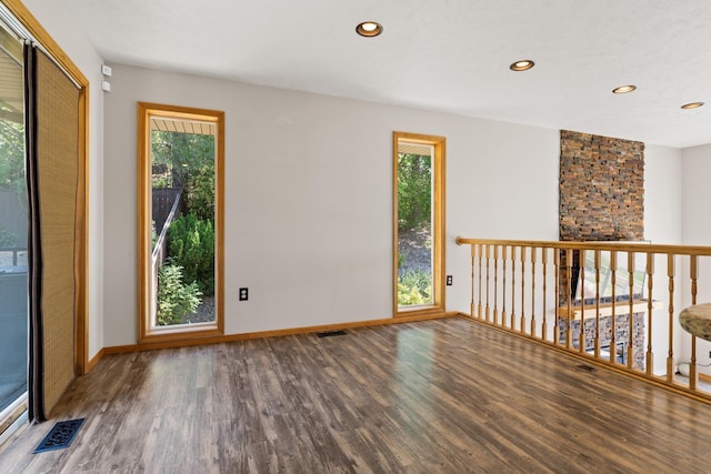 8603 E Columbia Park Dr, Spokane Valley, WA 99212 - unfurnished room featuring wood finished floors, healthy amount of natural light, and recessed lighting