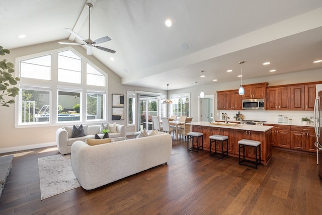 705 W Basalt Ridge Dr, Spokane, WA 99224 - living area with a ceiling fan, dark wood-style floors, recessed lighting, and high vaulted ceiling