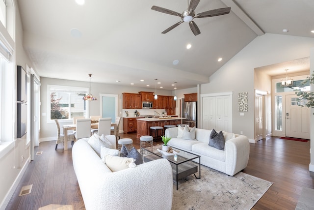 705 W Basalt Ridge Dr, Spokane, WA 99224 - living area featuring high vaulted ceiling, ceiling fan, wood finished floors, recessed lighting, and beam ceiling