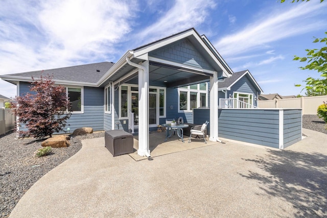 705 W Basalt Ridge Dr, Spokane, WA 99224 - rear view of house with a patio area