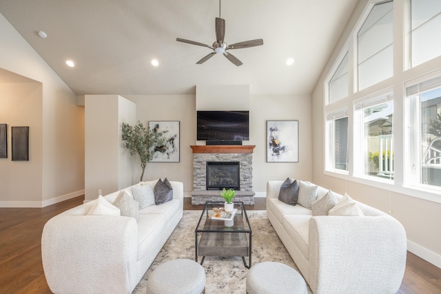705 W Basalt Ridge Dr, Spokane, WA 99224 - living room with lofted ceiling, wood finished floors, a ceiling fan, a stone fireplace, and recessed lighting