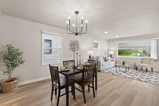 1115 E Everett Ave, Spokane, WA 99207 - dining area featuring a chandelier, light wood-style floors, crown molding, and recessed lighting