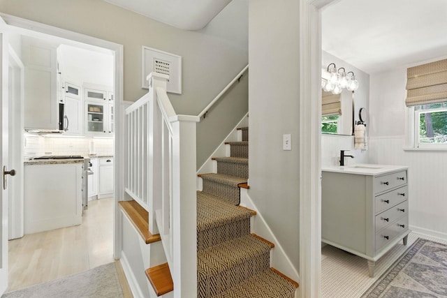 914 E 17th Ave, Spokane, WA 99203 - stairs with wood finished floors and wainscoting