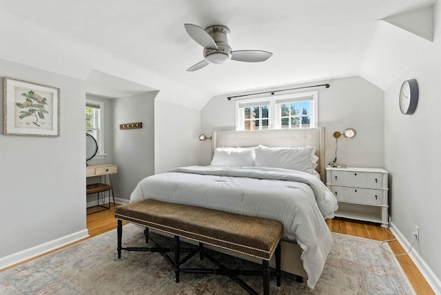 914 E 17th Ave, Spokane, WA 99203 - bedroom featuring vaulted ceiling, wood finished floors, and multiple windows