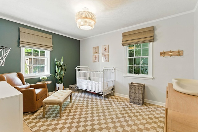 914 E 17th Ave, Spokane, WA 99203 - bedroom featuring a nursery area and ornamental molding