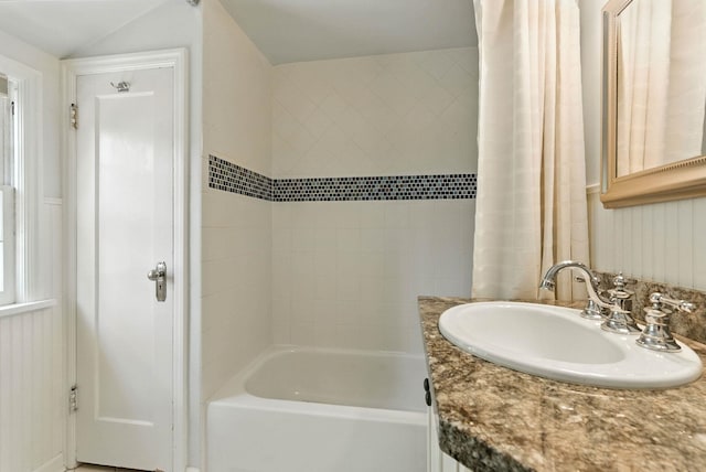 914 E 17th Ave, Spokane, WA 99203 - full bathroom featuring vanity, shower / tub combo, and lofted ceiling