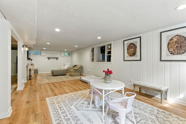914 E 17th Ave, Spokane, WA 99203 - dining space featuring light wood-style floors, a textured ceiling, and recessed lighting