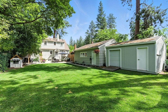 914 E 17th Ave, Spokane, WA 99203 - view of grassy yard featuring an outdoor structure