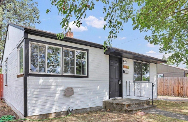 5704 N Milton St, Spokane, WA 99205 - view of front of home featuring a chimney