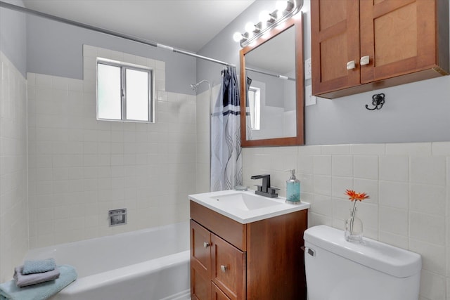 5704 N Milton St, Spokane, WA 99205 - bathroom featuring vanity, shower / bathtub combination with curtain, and tile walls