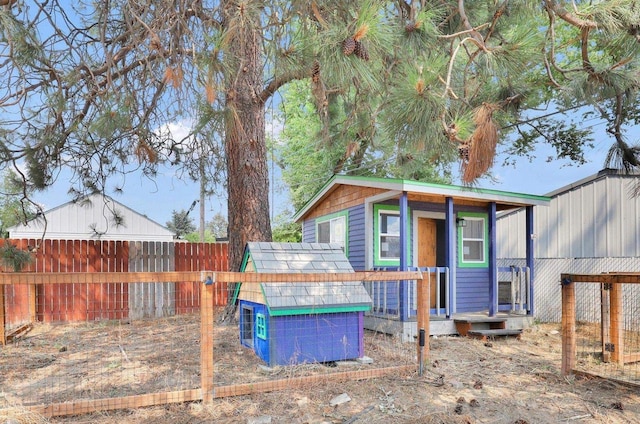 5704 N Milton St, Spokane, WA 99205 - fenced backyard with an outdoor structure