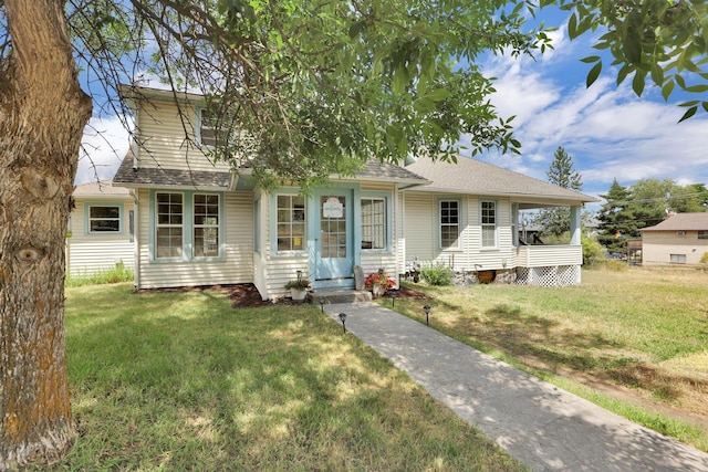 3504 W 2nd Ave, Spokane, WA 99224 - view of front facade featuring a front lawn and a shingled roof