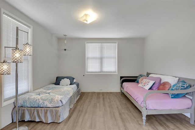 3504 W 2nd Ave, Spokane, WA 99224 - bedroom featuring multiple windows and wood finished floors