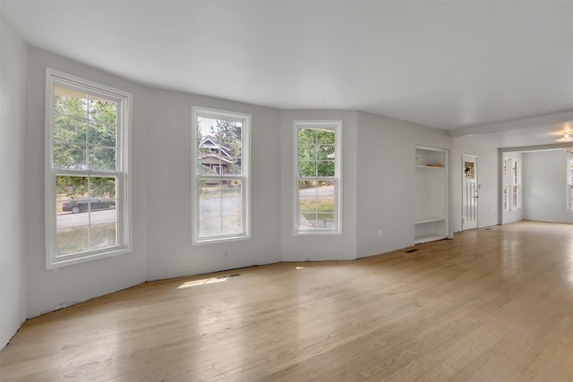 3504 W 2nd Ave, Spokane, WA 99224 - unfurnished living room featuring light wood-style flooring