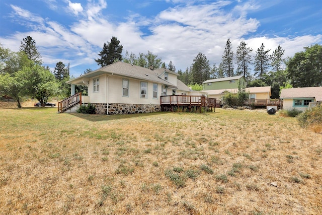 3504 W 2nd Ave, Spokane, WA 99224 - back of property with a lawn and a wooden deck