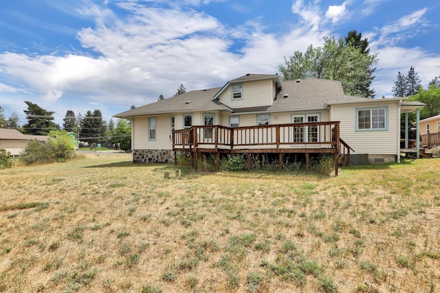 3504 W 2nd Ave, Spokane, WA 99224 - rear view of house with a wooden deck, crawl space, and a lawn