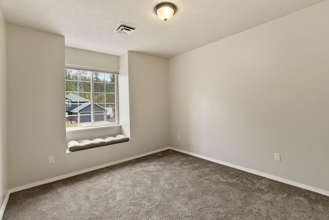 14 W Elcliff Ave, Spokane, WA 99218 - empty room featuring carpet and baseboards