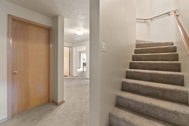 14 W Elcliff Ave, Spokane, WA 99218 - stairs featuring carpet floors and baseboards