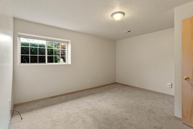 14 W Elcliff Ave, Spokane, WA 99218 - carpeted empty room featuring baseboards