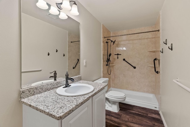 14 W Elcliff Ave, Spokane, WA 99218 - full bath with wood finished floors, a shower stall, and vanity