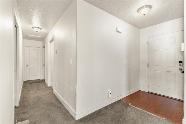7619 S Camille Ct, Cheney, WA 99004 - carpeted foyer entrance with a textured ceiling