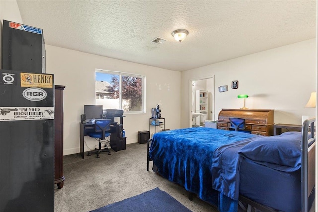 7619 S Camille Ct, Cheney, WA 99004 - bedroom featuring carpet floors, an office area, and a textured ceiling