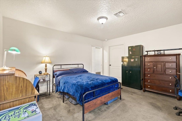 7619 S Camille Ct, Cheney, WA 99004 - carpeted bedroom featuring a textured ceiling