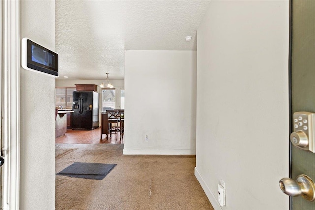 7619 S Camille Ct, Cheney, WA 99004 - hall with carpet flooring and a textured ceiling