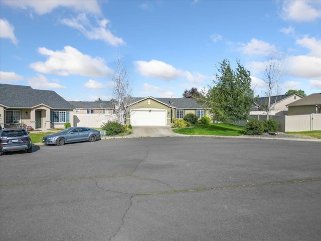 7619 S Camille Ct, Cheney, WA 99004 - view of front of property featuring a residential view, concrete driveway, and an attached garage