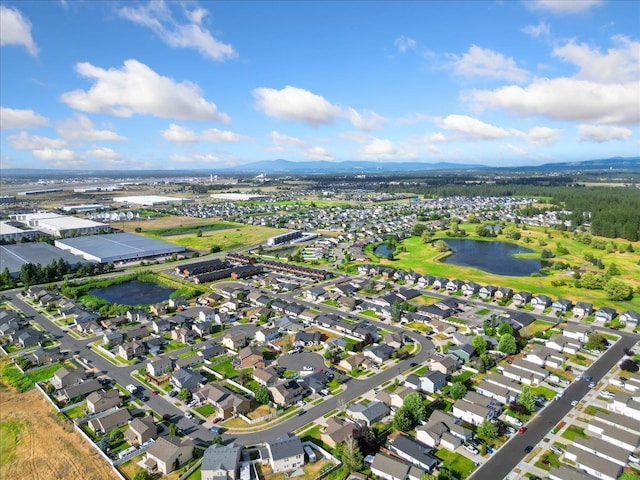 7619 S Camille Ct, Cheney, WA 99004 - aerial view of property and surrounding area featuring a water and mountain view and nearby suburban area