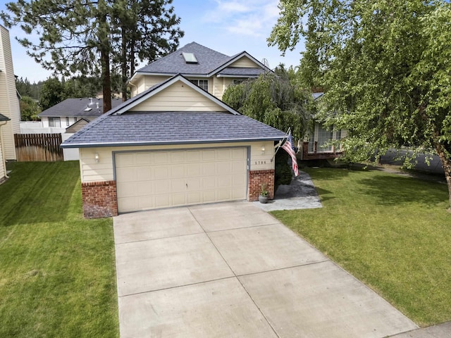 5706 W Excell Ave, Spokane, WA 99208 - view of front of property with brick siding, roof with shingles, driveway, and a garage