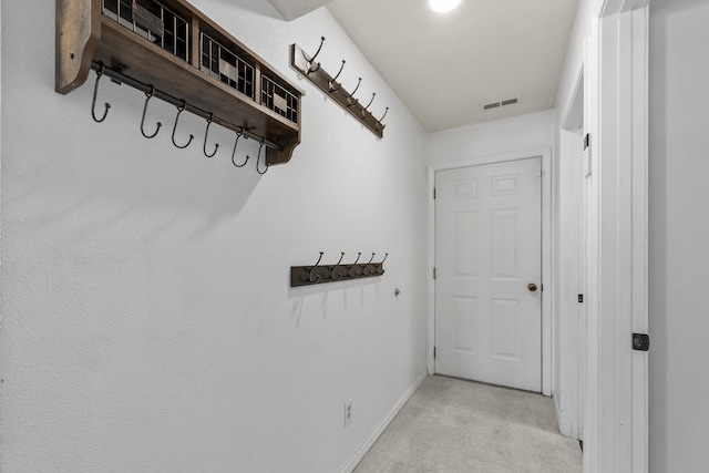 5706 W Excell Ave, Spokane, WA 99208 - corridor featuring light carpet and baseboards