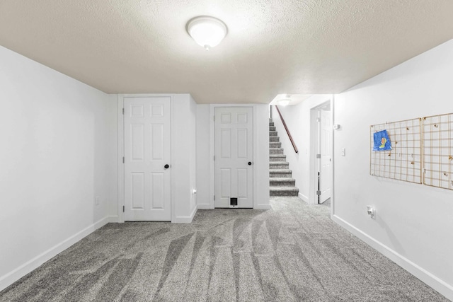 5706 W Excell Ave, Spokane, WA 99208 - bonus room featuring a textured ceiling, carpet, and stairs