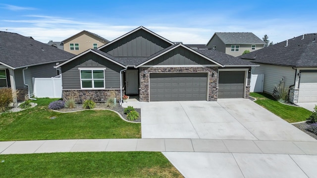 8410 W Sugar Ct, Cheney, WA 99004 - craftsman-style house featuring board and batten siding, a garage, stone siding, and concrete driveway