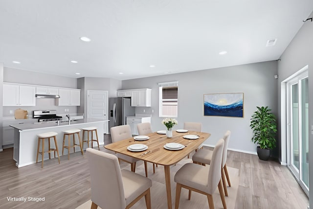 8410 W Sugar Ct, Cheney, WA 99004 - dining room featuring light wood finished floors and recessed lighting