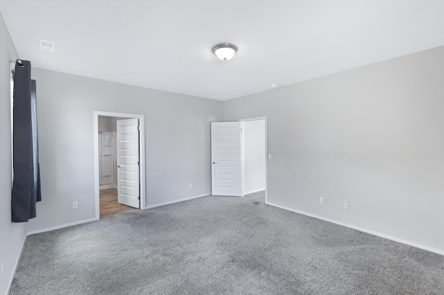 8410 W Sugar Ct, Cheney, WA 99004 - unfurnished bedroom with carpet floors and baseboards