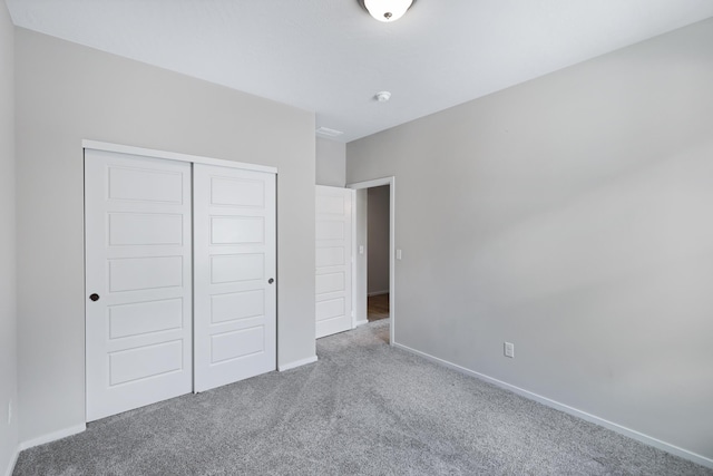 8410 W Sugar Ct, Cheney, WA 99004 - unfurnished bedroom featuring carpet floors and a closet