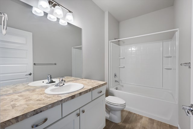 8410 W Sugar Ct, Cheney, WA 99004 - full bath with vanity, wood finished floors, and washtub / shower combination
