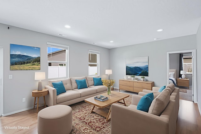 8410 W Sugar Ct, Cheney, WA 99004 - living room featuring light wood-style flooring, recessed lighting, and a mountain view