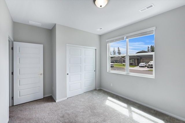 8410 W Sugar Ct, Cheney, WA 99004 - unfurnished bedroom with a closet and carpet flooring