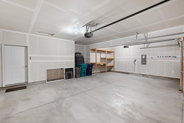 8410 W Sugar Ct, Cheney, WA 99004 - garage featuring electric panel and a garage door opener