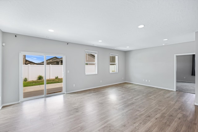 8410 W Sugar Ct, Cheney, WA 99004 - empty room featuring wood finished floors and recessed lighting