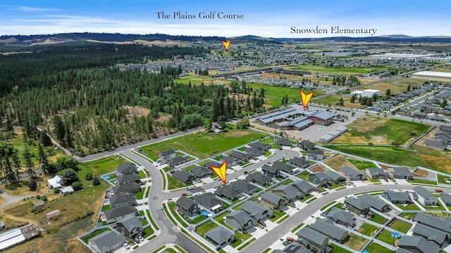 8410 W Sugar Ct, Cheney, WA 99004 - view of property location featuring a mountain backdrop and nearby suburban area