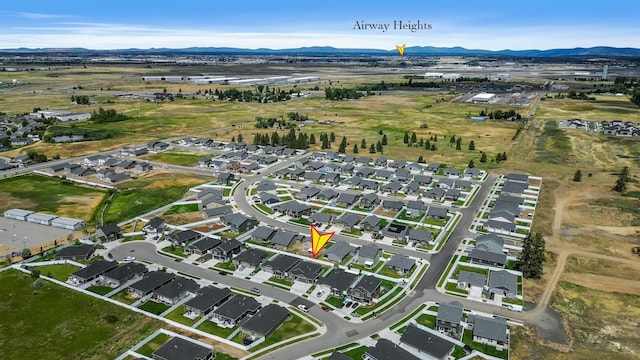 8410 W Sugar Ct, Cheney, WA 99004 - aerial overview of property's location with a mountainous background