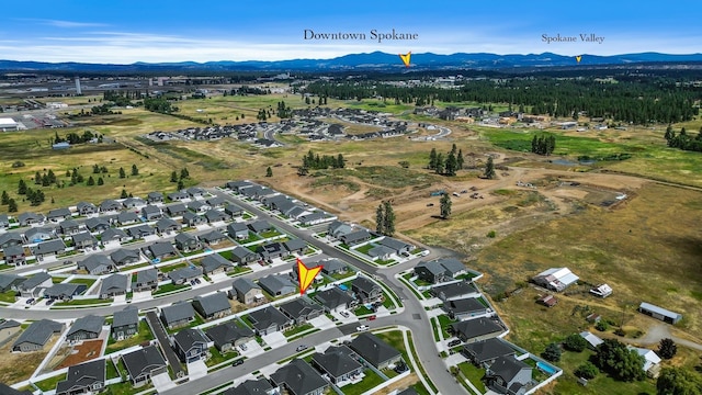 8410 W Sugar Ct, Cheney, WA 99004 - aerial view of property and surrounding area featuring a mountain backdrop