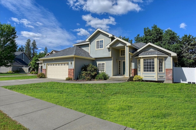 6919 N Pine Rock Pl, Spokane, WA 99208 - view of front of house with brick siding, an attached garage, and concrete driveway