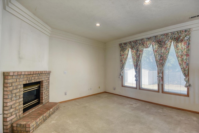 6919 N Pine Rock Pl, Spokane, WA 99208 - unfurnished living room with light carpet, recessed lighting, and a brick fireplace