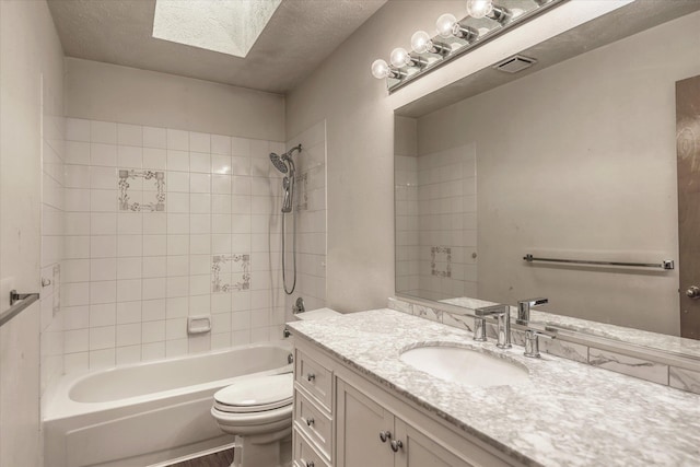 6919 N Pine Rock Pl, Spokane, WA 99208 - full bathroom featuring vanity, a skylight, and tub / shower combination