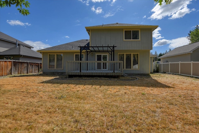 6919 N Pine Rock Pl, Spokane, WA 99208 - rear view of property featuring a wooden deck, a pergola, and a fenced backyard